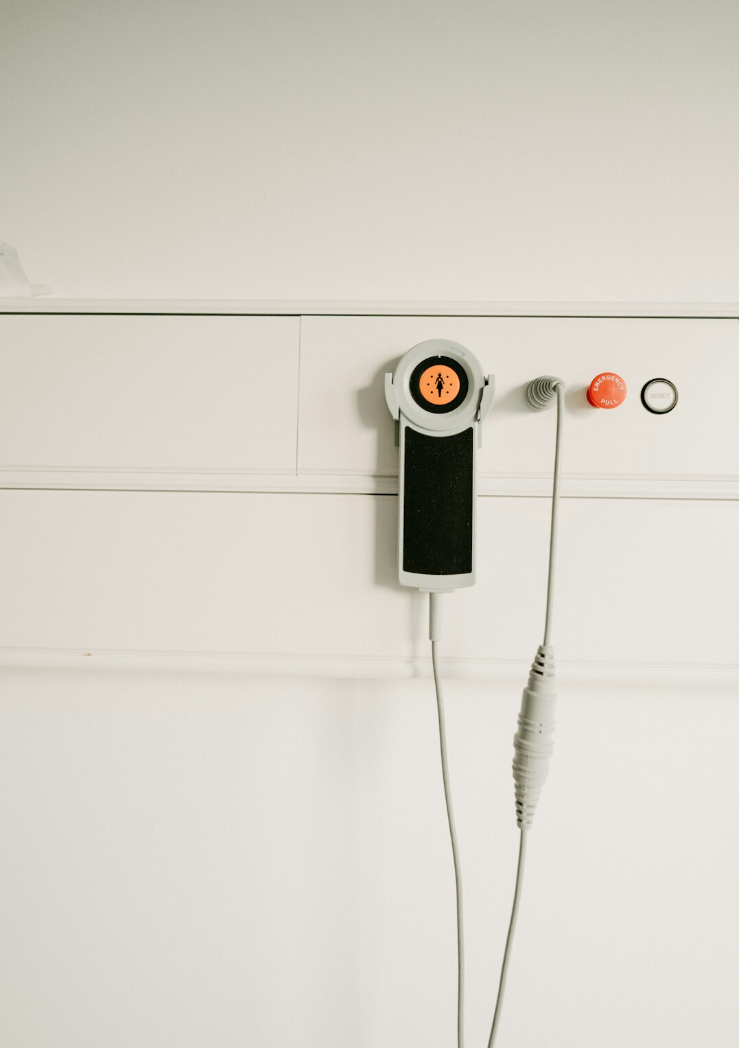 Shelves with wireless lavalier microphones, headphones and cables in an equipment room